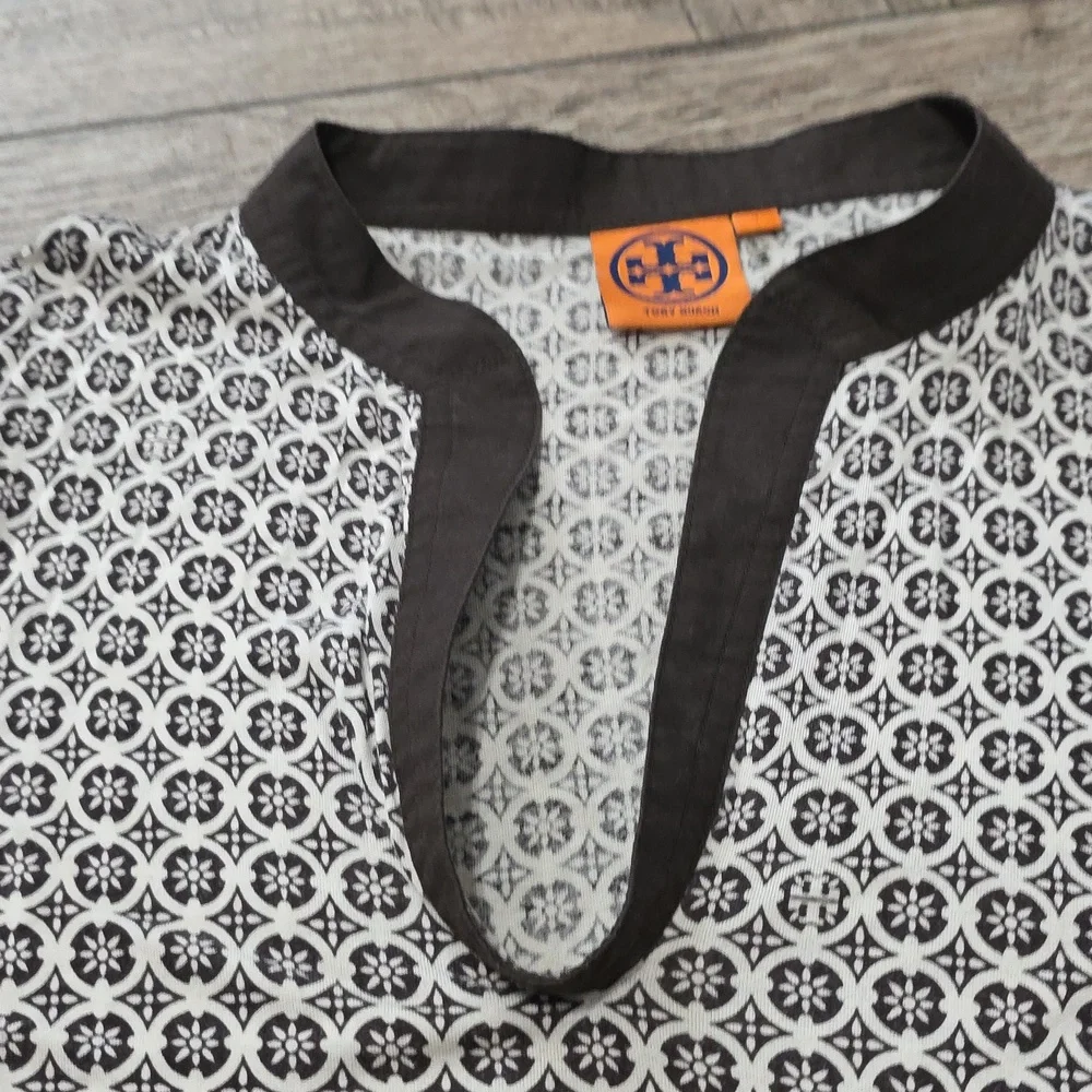 Tory Burch printed tunic top featuring a split neckline and long sleeves